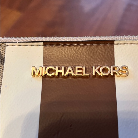 Like new Michael Kors Brown and Cream Monogram Clutch - Picture 2 of 16